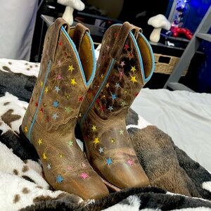 These beautiful boots with colorful stars all over very nice interior and blue!
